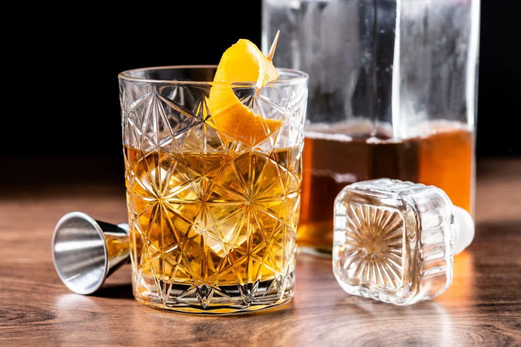Whiskey decanter and a poured glass set up for a tasting at home